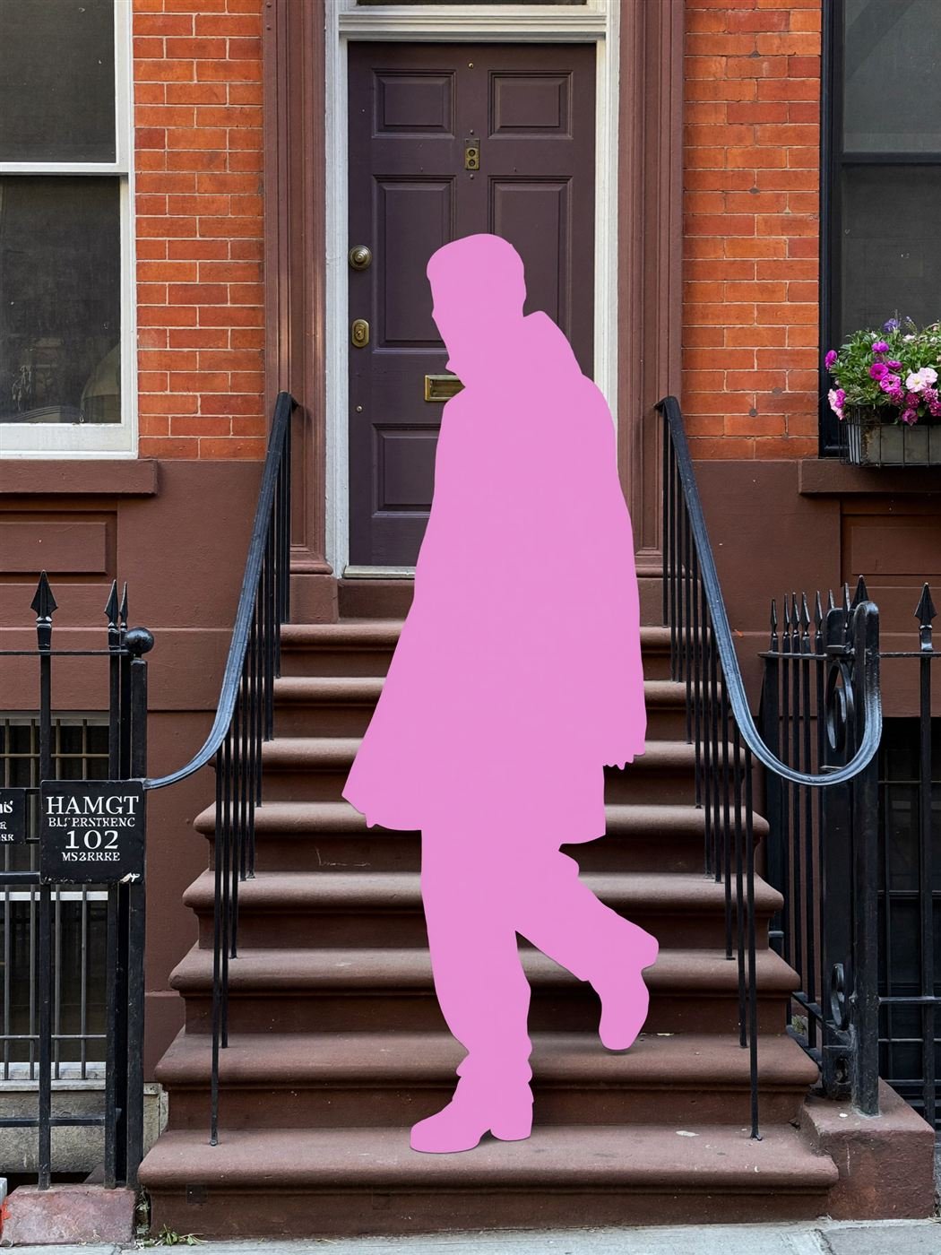 A brownstone stoop at midday